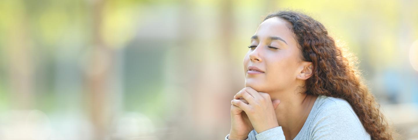 Woman with eyes closed